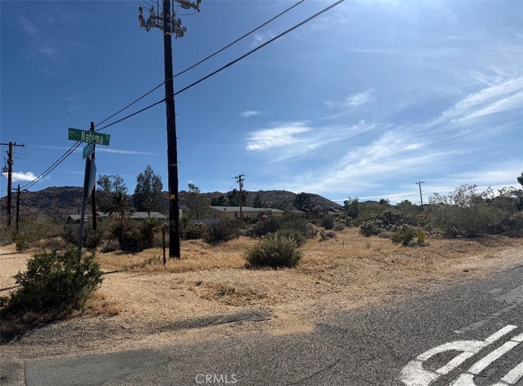 7373 Sunny Vista Road Joshua Tree, CA 92252 - Photo 6 of 6 a view of a road with a snow on the road