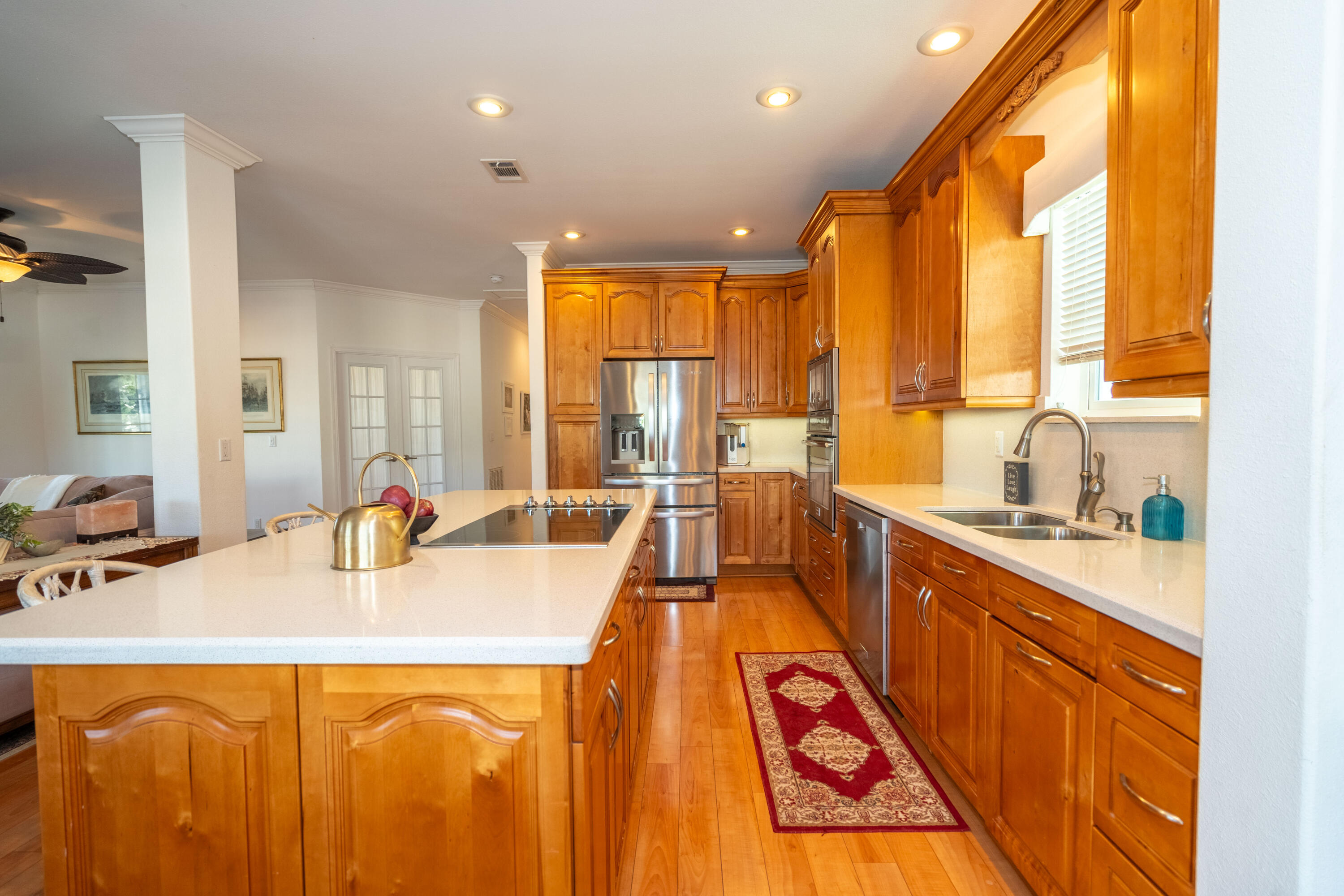 55 Ocean Drive Key Largo, FL 33037 - Photo 11 of 53 a large kitchen with kitchen island a large window