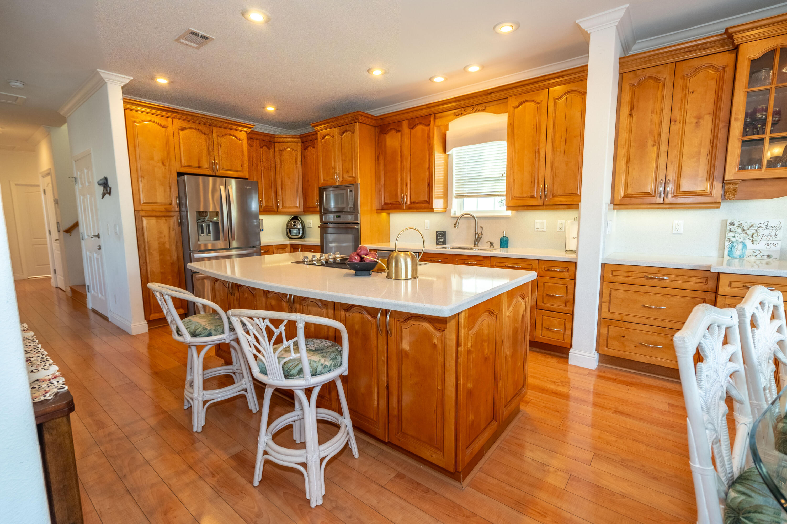 55 Ocean Drive Key Largo, FL 33037 - Photo 12 of 53 a dining table with chairs and wooden floor