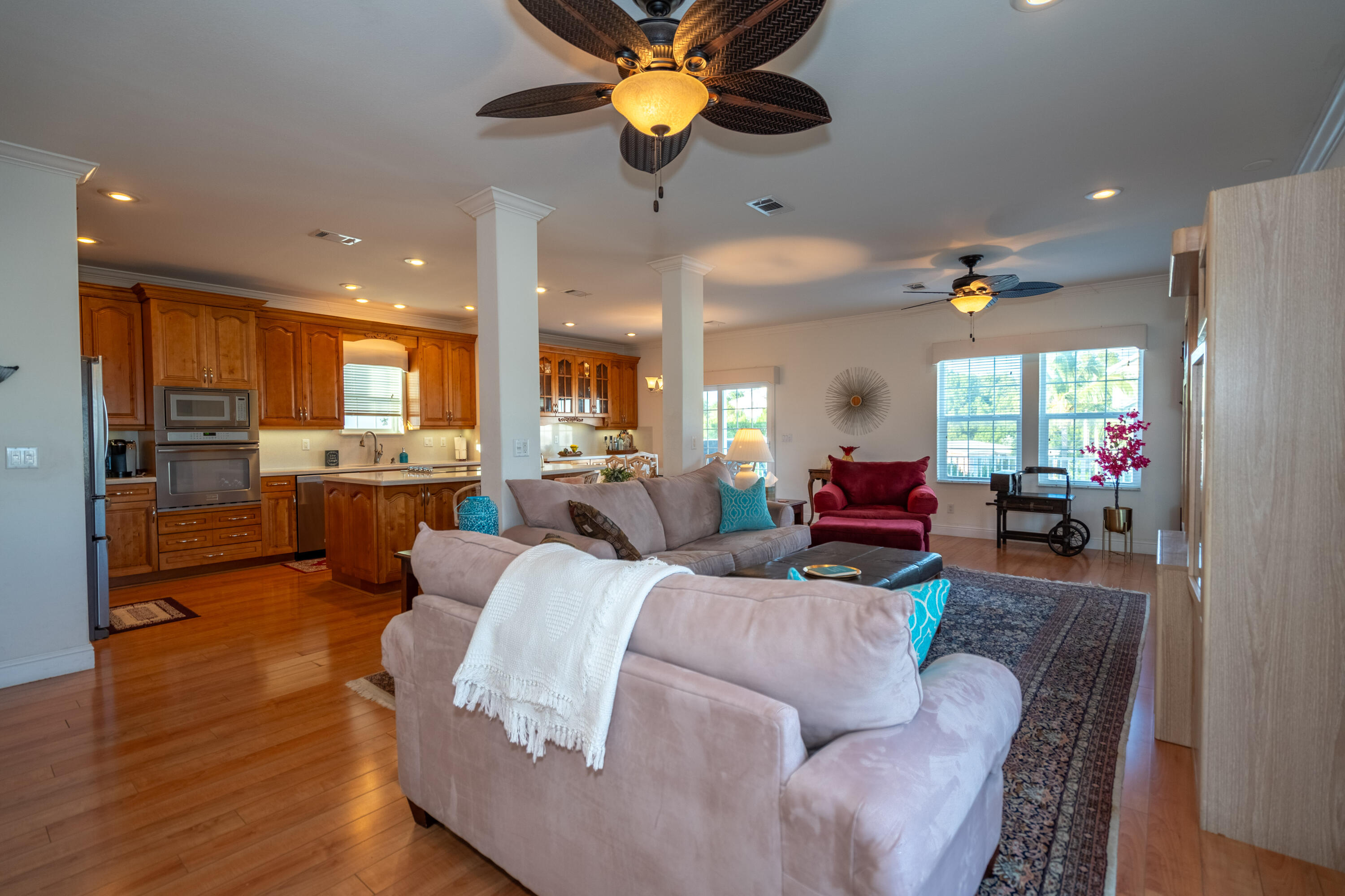 55 Ocean Drive Key Largo, FL 33037 - Photo 13 of 53 a living room with furniture kitchen view and a chandelier