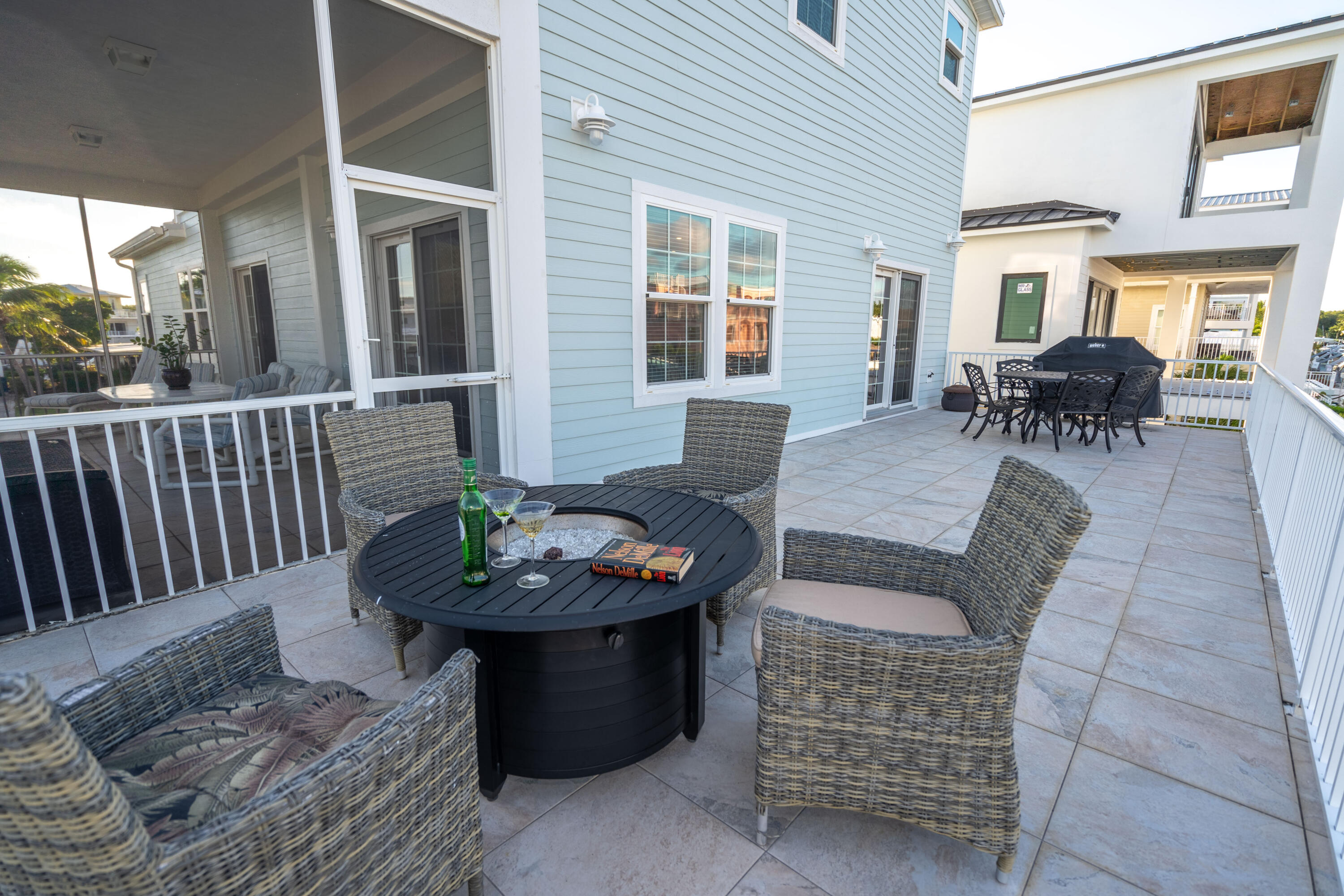 55 Ocean Drive Key Largo, FL 33037 - Photo 21 of 53 a outdoor space with patio the couches and a dining table with garden view