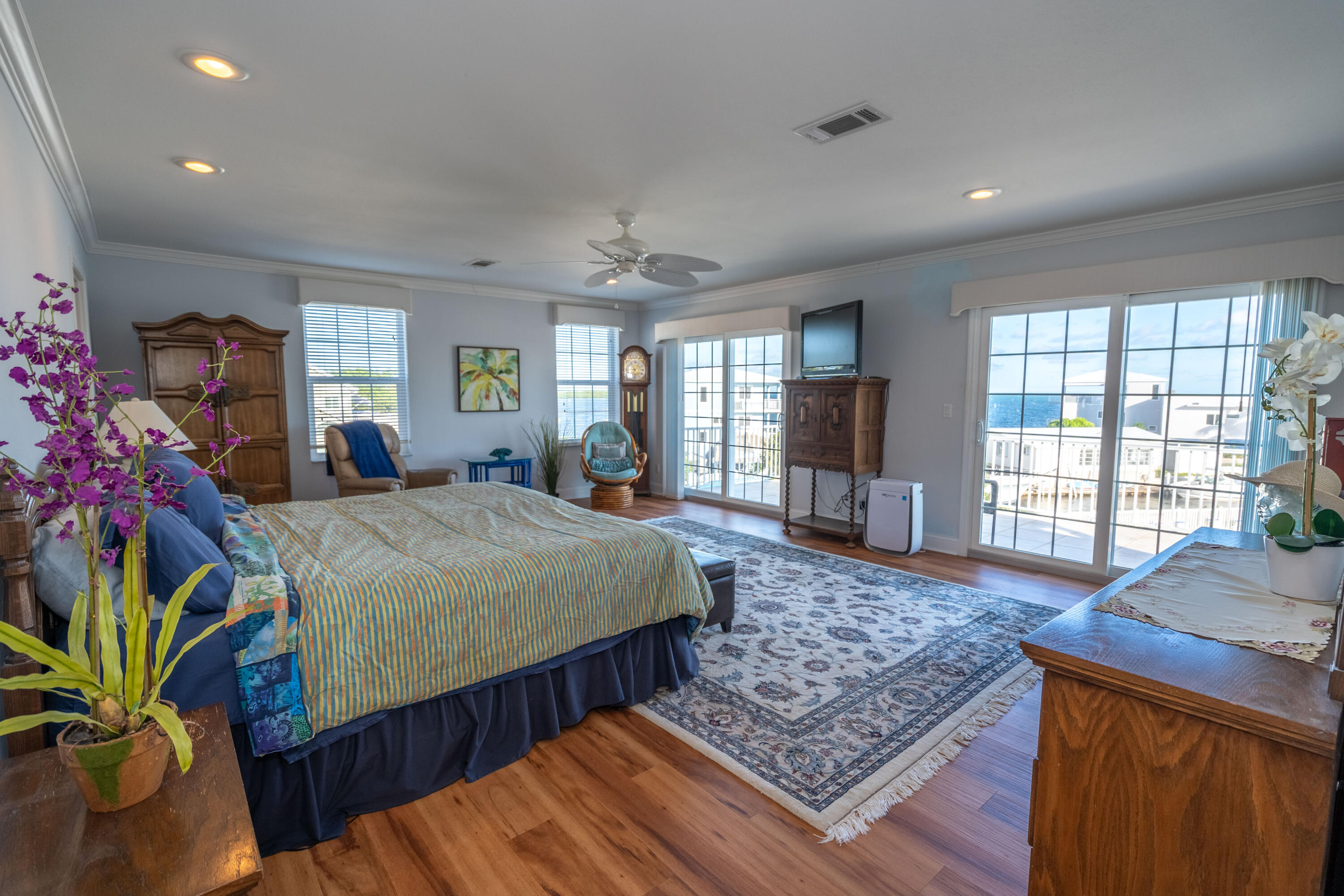 55 Ocean Drive Key Largo, FL 33037 - Photo 26 of 53 a spacious bedroom with a large bed and a window