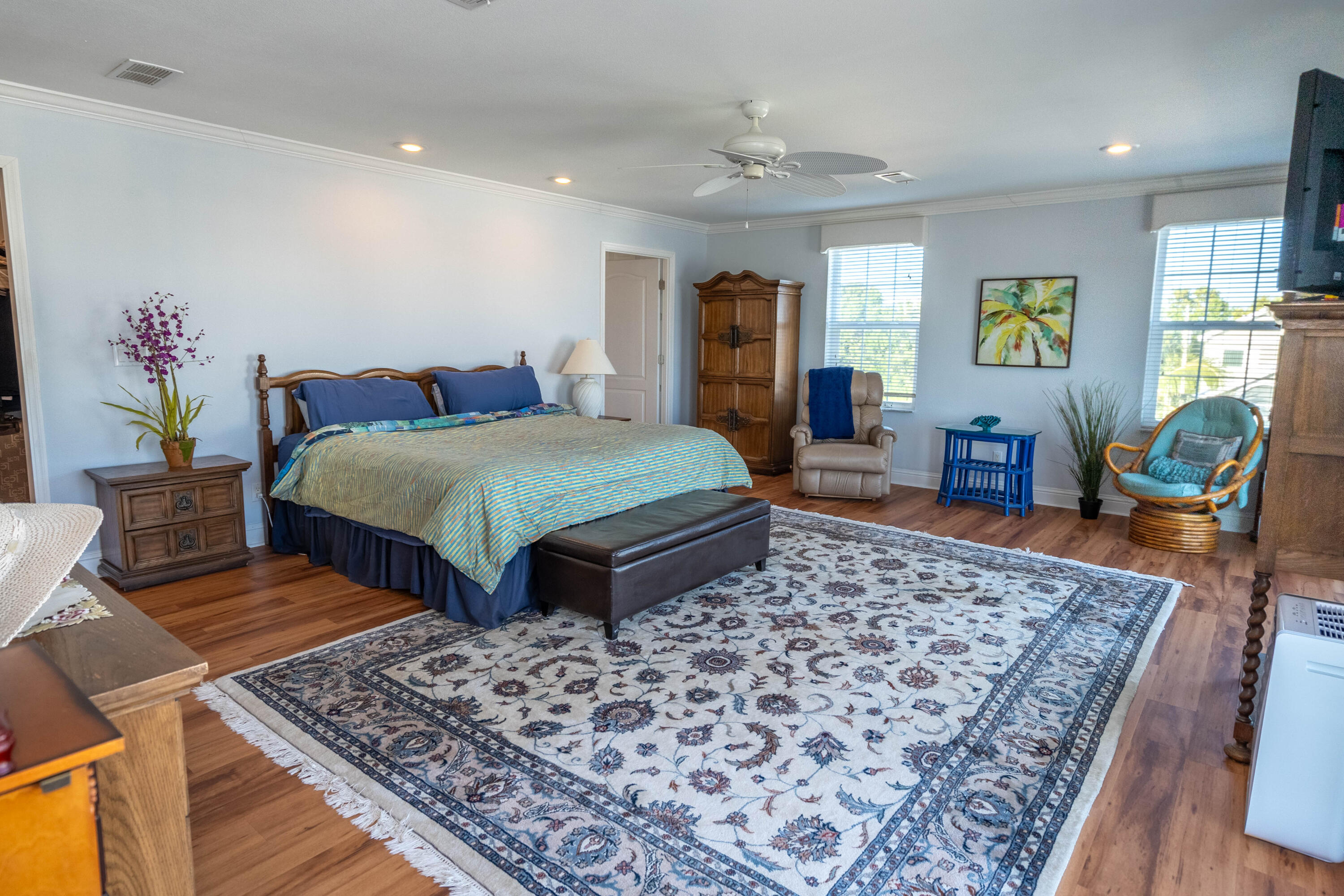 55 Ocean Drive Key Largo, FL 33037 - Photo 28 of 53 a bedroom with a large bed and a dresser