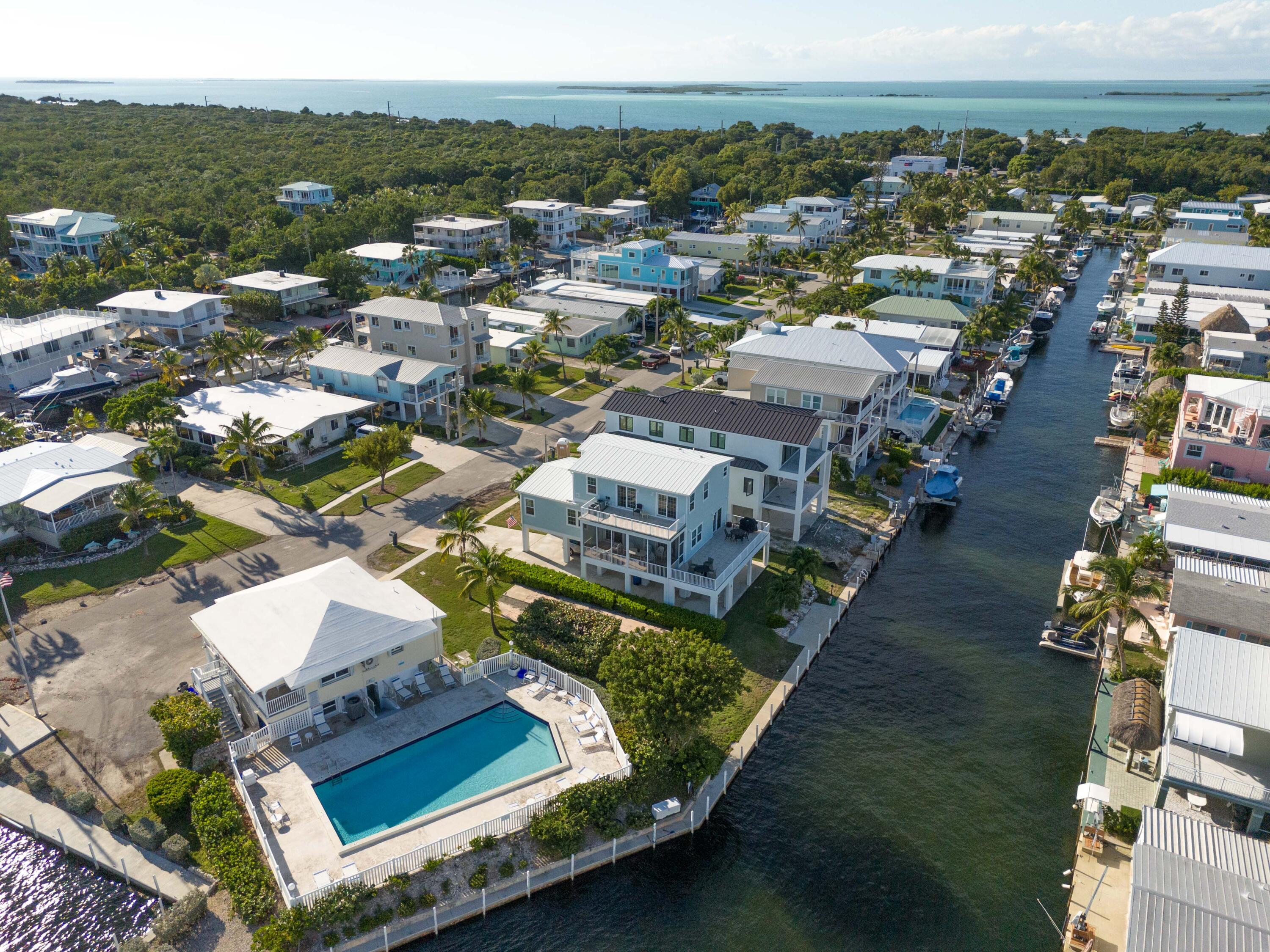 55 Ocean Drive Key Largo, FL 33037 - Photo 3 of 53 an aerial view of residential houses with outdoor space