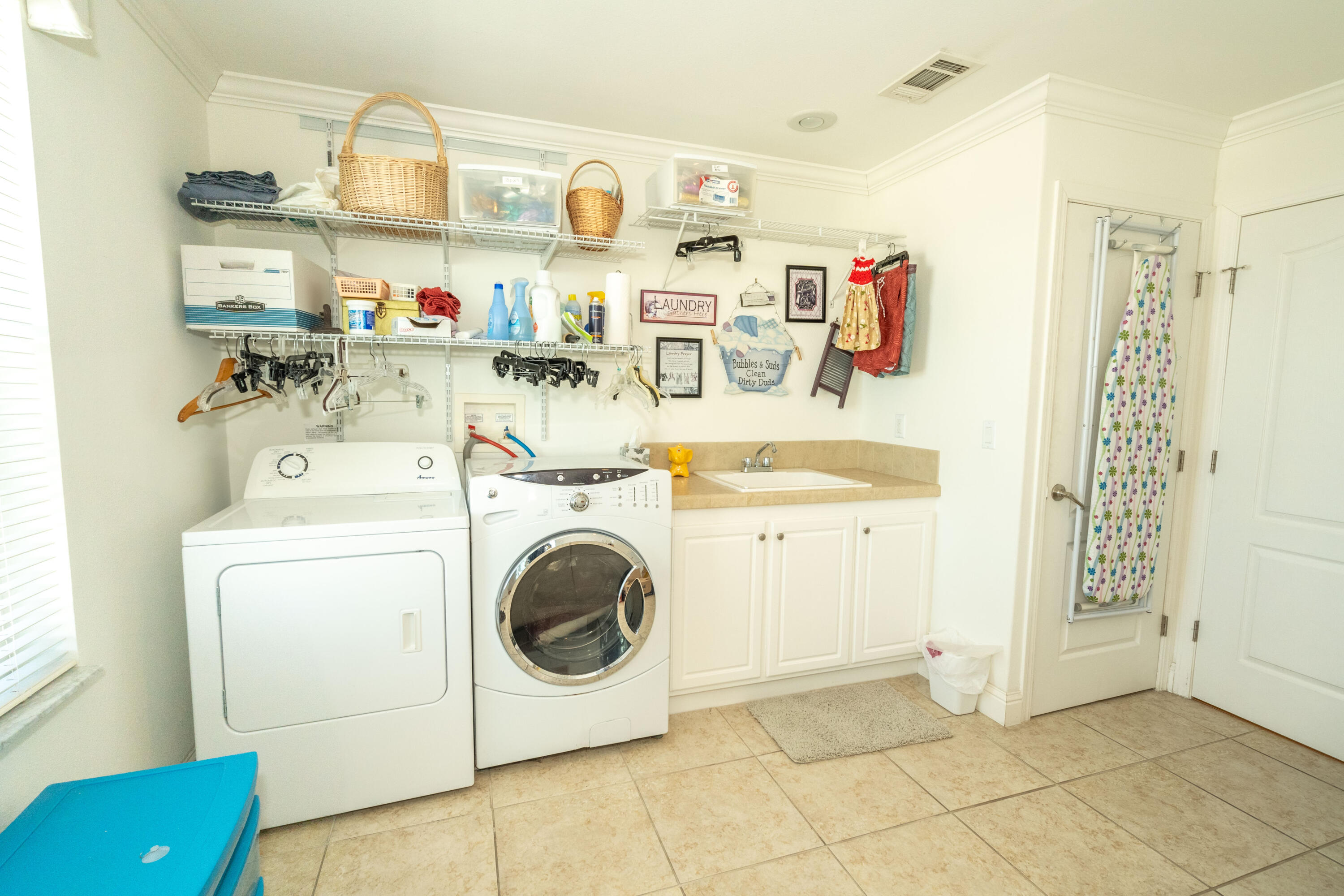 55 Ocean Drive Key Largo, FL 33037 - Photo 33 of 53 a utility room with dryer and washer