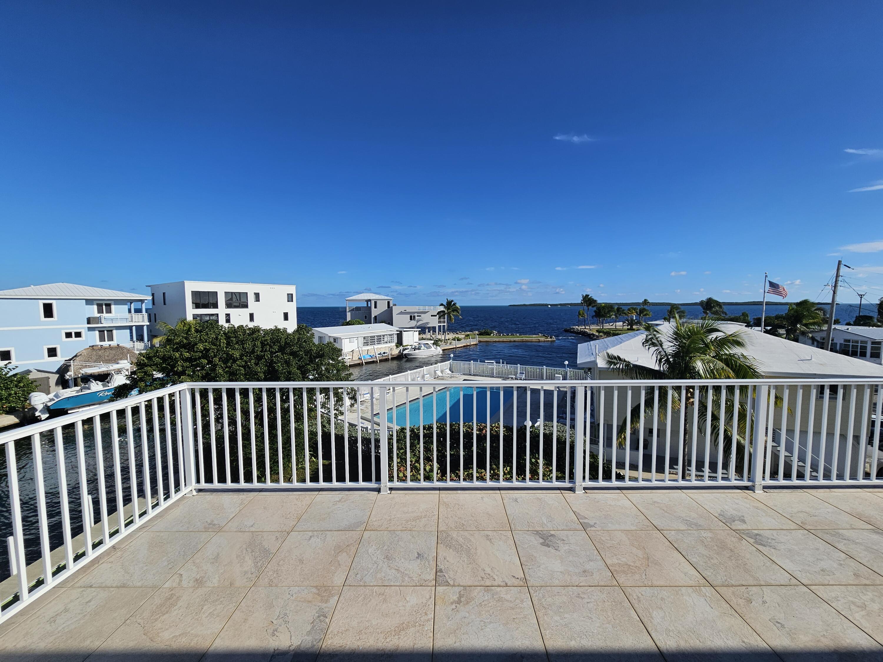 55 Ocean Drive Key Largo, FL 33037 - Photo 38 of 53 a view of balcony with wooden floor