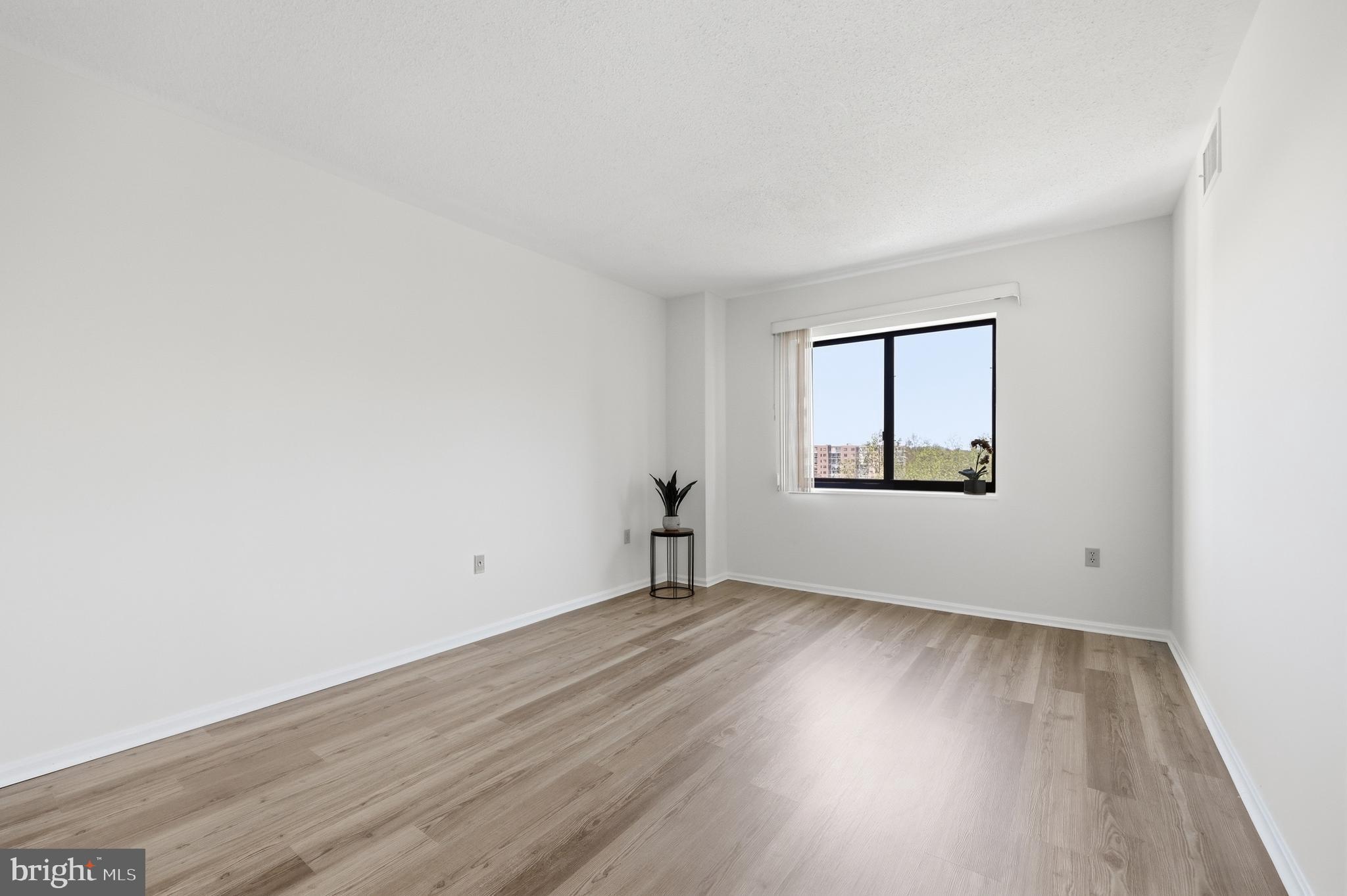 15107 Interlachen Drive, Unit 21006 Silver Spring, MD 20906 - Photo 20 of 29 Primary Bedroom