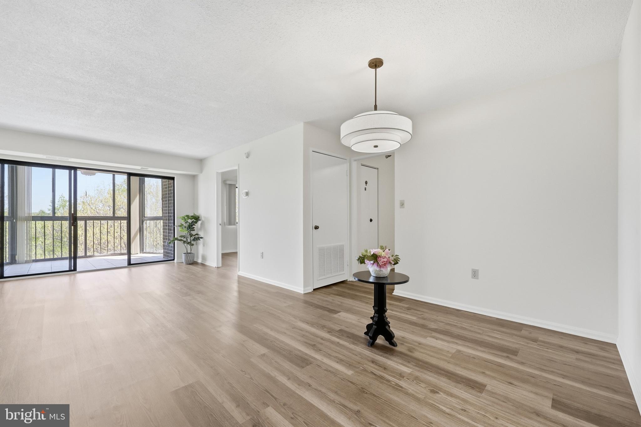 15107 Interlachen Drive, Unit 21006 Silver Spring, MD 20906 - Photo 8 of 29 Dining Room into Living Room