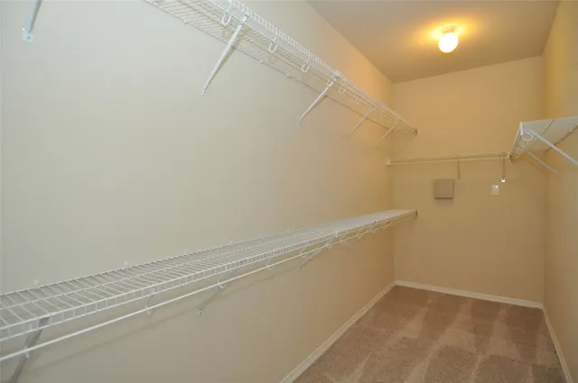 a view of a room with racks on the wall