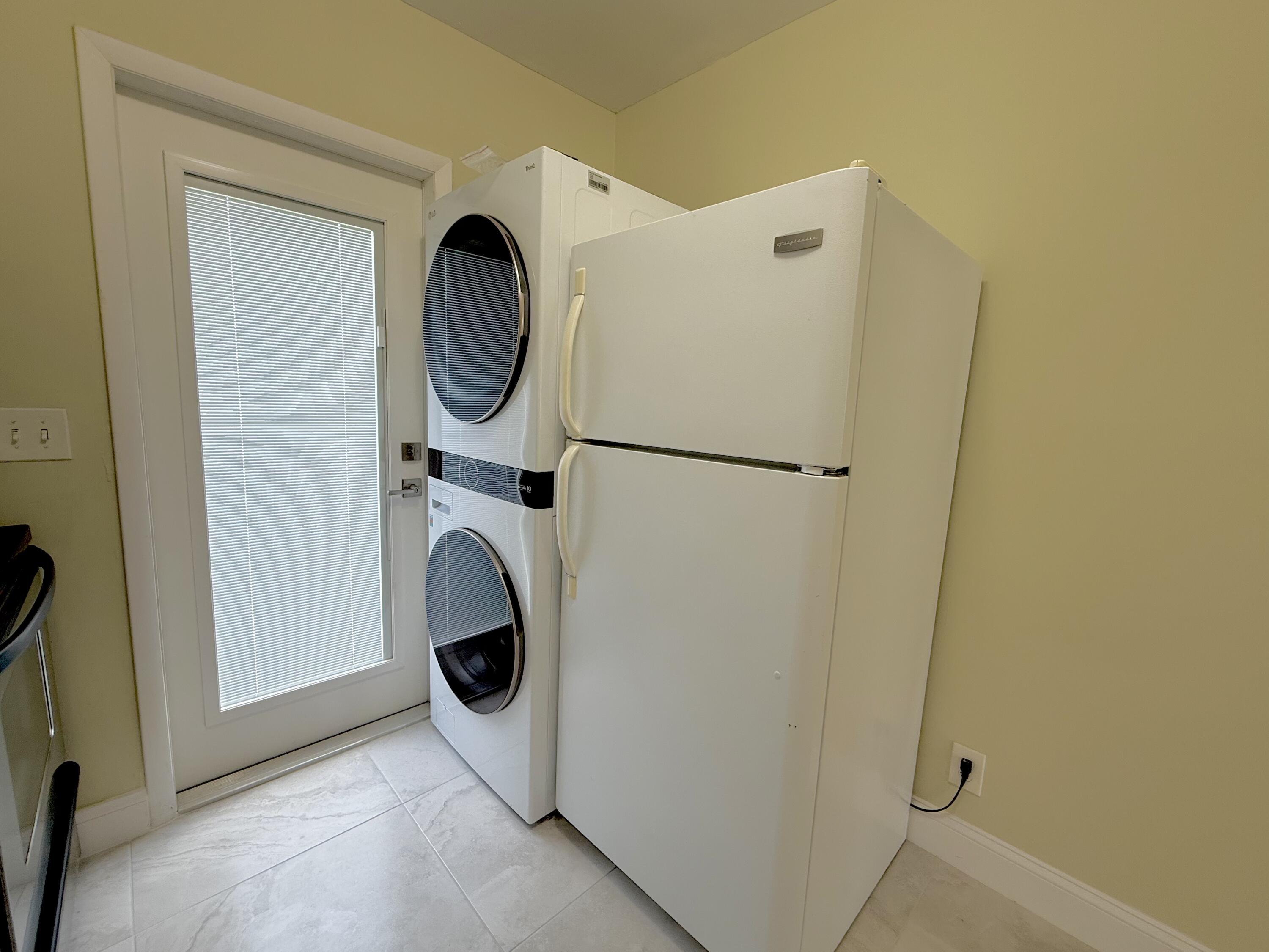 1691 West 26th Street, Unit 1 Riviera Beach, FL 33404 - Photo 3 of 6 In Unit Washer and Dryer