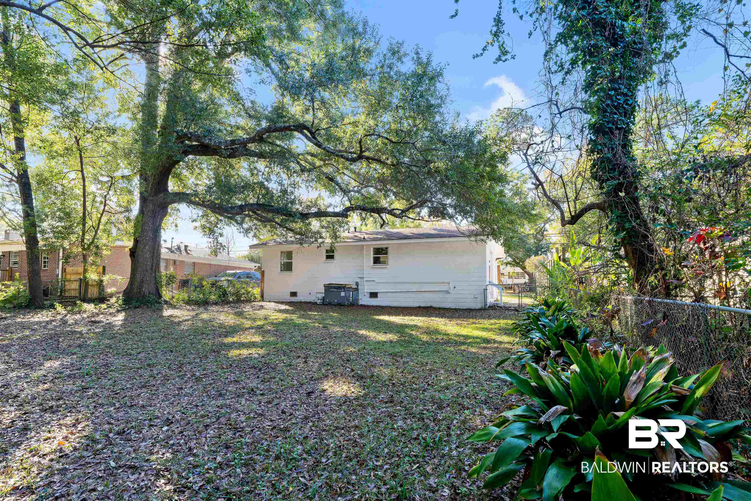 507 Gayfer Avenue Fairhope, AL 36532 - Photo 17 of 18 Backyard and Home