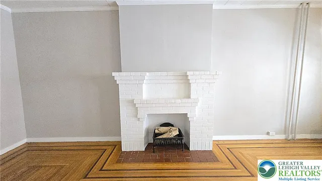 a living room with a fireplace