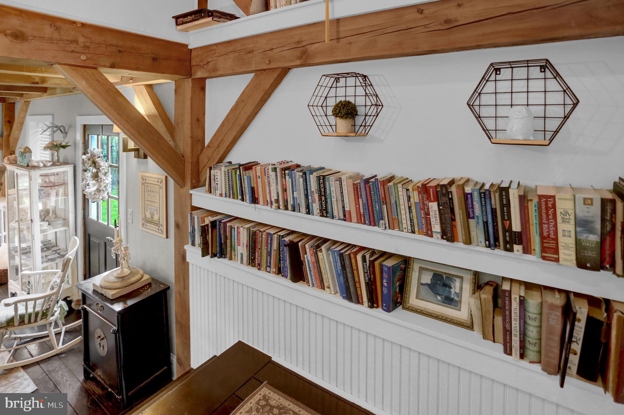 573 Spangler School Road Gettysburg, PA 17325 - Photo 54 of 101 Stairwell bookcase