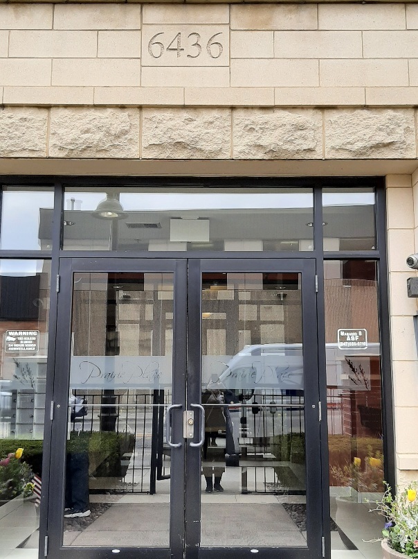 6436 Roosevelt Road, Unit 209 Oak Park, IL 60304 - Photo 2 of 25 a front view of a building with street