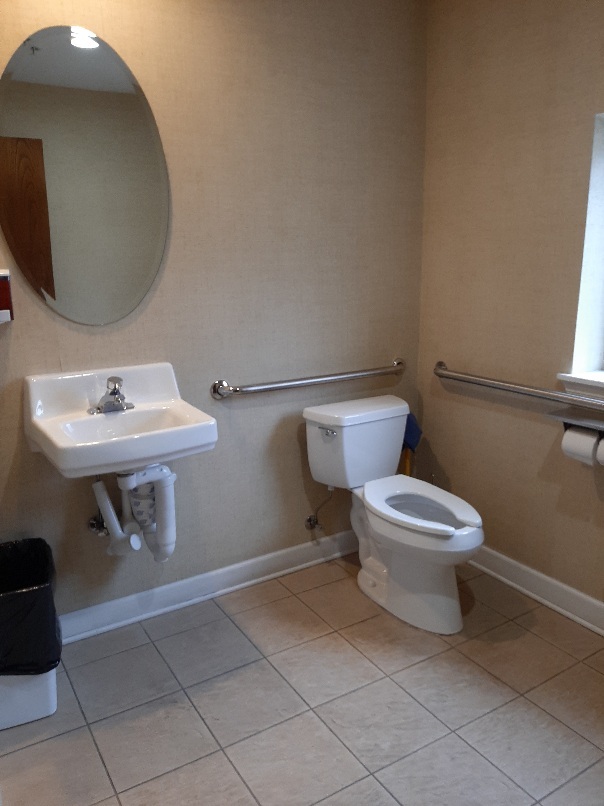 6436 Roosevelt Road, Unit 209 Oak Park, IL 60304 - Photo 24 of 25 a white toilet sitting next to a bathroom sink