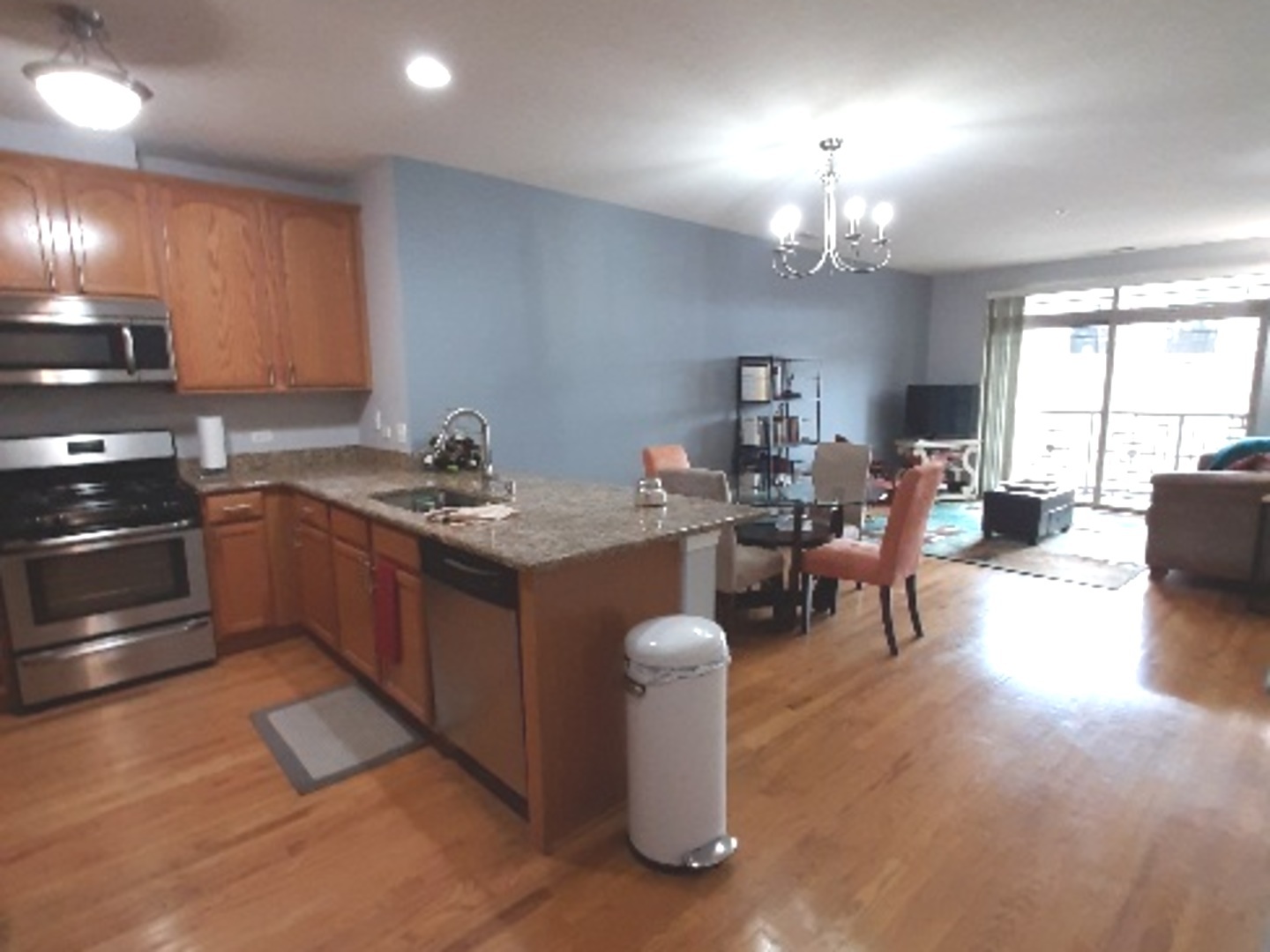 6436 Roosevelt Road, Unit 209 Oak Park, IL 60304 - Photo 6 of 25 a kitchen with a sink cabinets and window