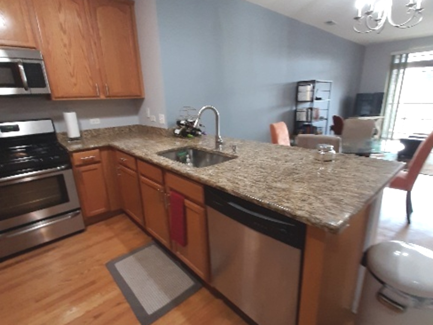 6436 Roosevelt Road, Unit 209 Oak Park, IL 60304 - Photo 7 of 25 a kitchen with sink and stove