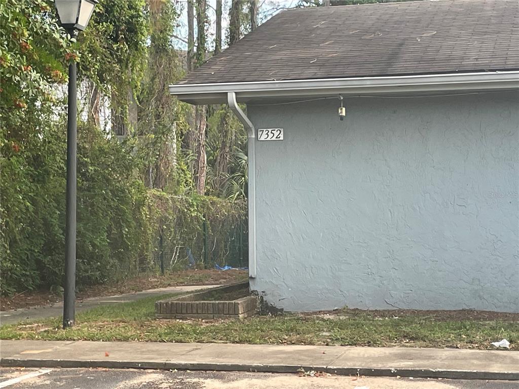 7352 Balboa Drive, Unit 7352 Orlando, FL 32818 - Photo 2 of 6 a view of a wooden door