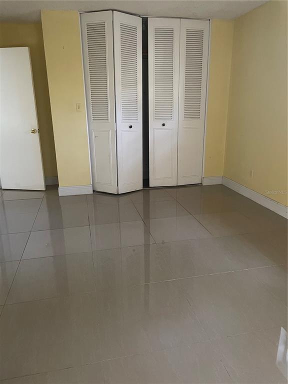 7352 Balboa Drive, Unit 7352 Orlando, FL 32818 - Photo 5 of 6 a view of an empty room