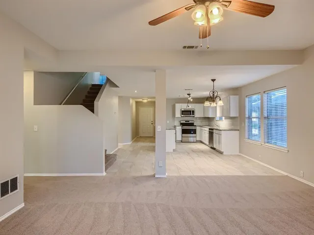 a view of kitchen with wooden floor