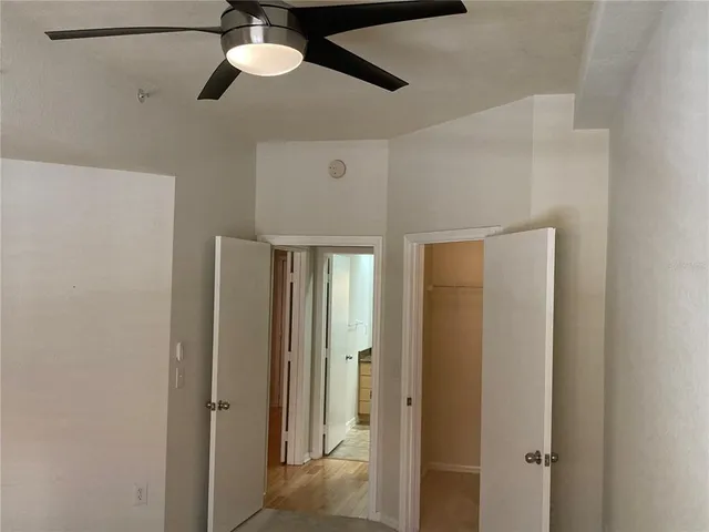 a view of a hallway with a closet