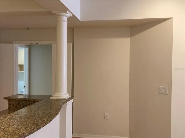 a living room with granite countertop and a granite counter top