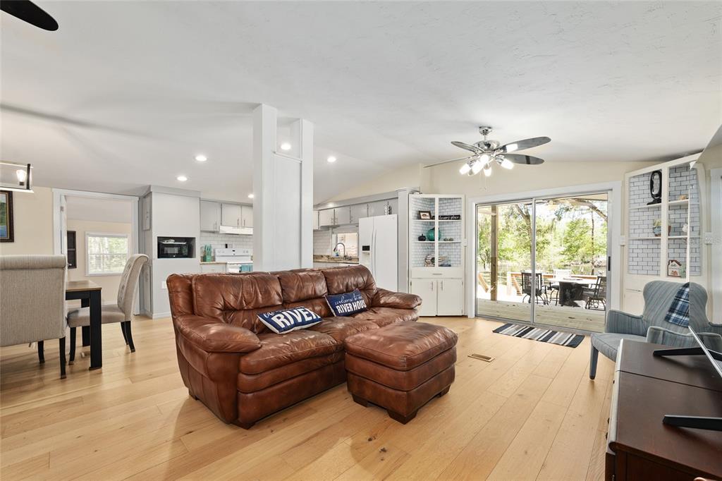 7870 Southwest 25th Place Bell, FL 32619 - Photo 69 of 99 a living room with furniture and a large window