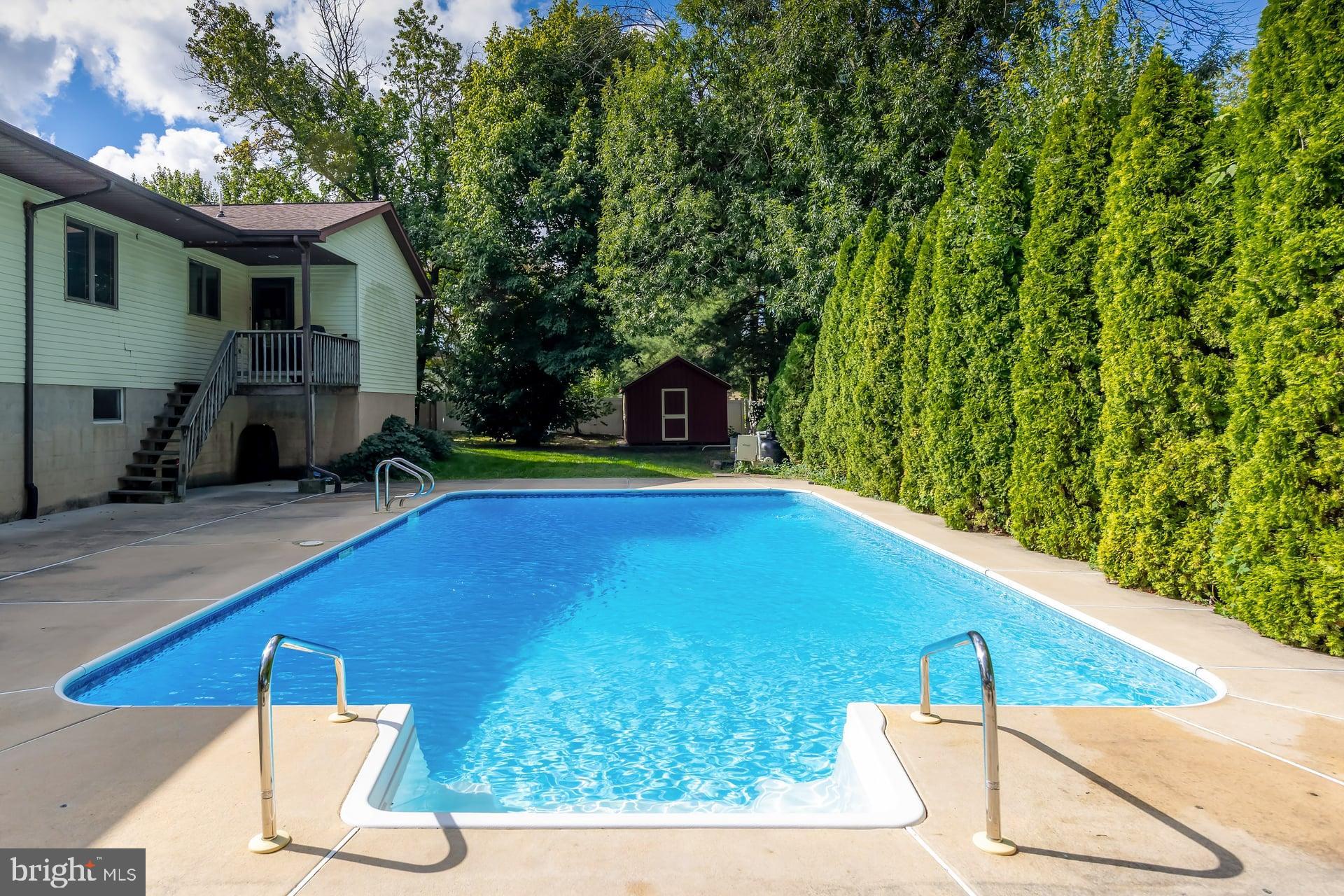 175 Queen Street West Deptford, NJ 08086 - Photo 19 of 23 a view of swimming pool with a backyard