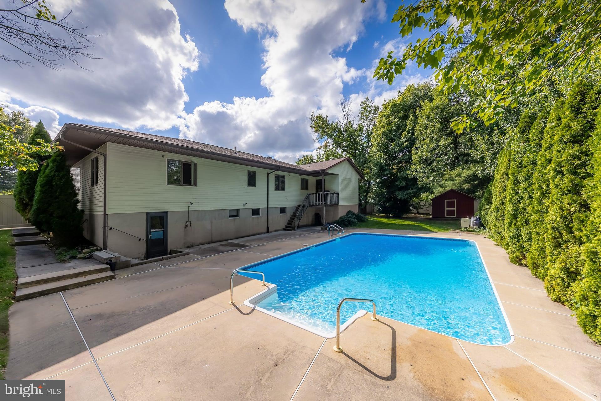 175 Queen Street West Deptford, NJ 08086 - Photo 20 of 23 a view of backyard with swimming pool and seating space