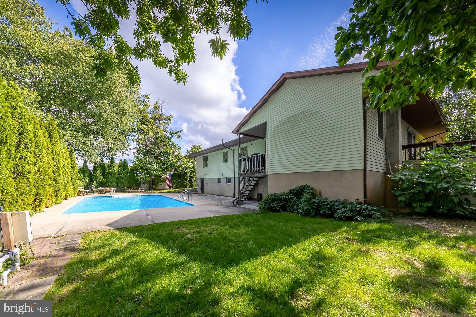 175 Queen Street West Deptford, NJ 08086 - Photo 23 of 23 a view of a backyard with a large tree