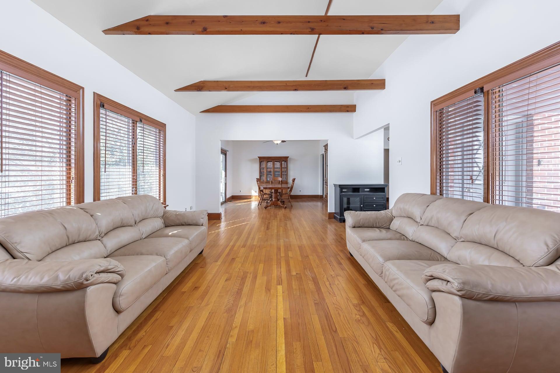 175 Queen Street West Deptford, NJ 08086 - Photo 3 of 23 a living room with furniture and a wooden floor