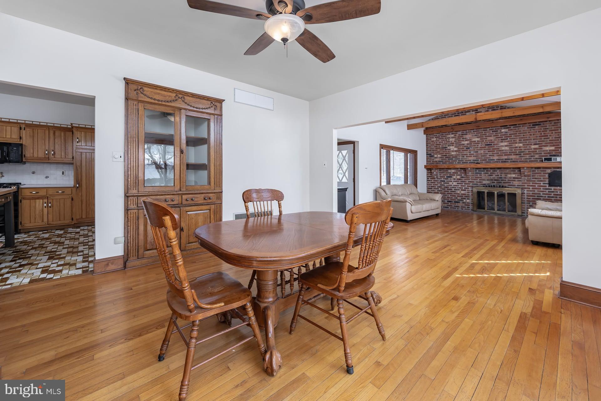 175 Queen Street West Deptford, NJ 08086 - Photo 5 of 23 a view of a dining room with furniture window and wooden floor