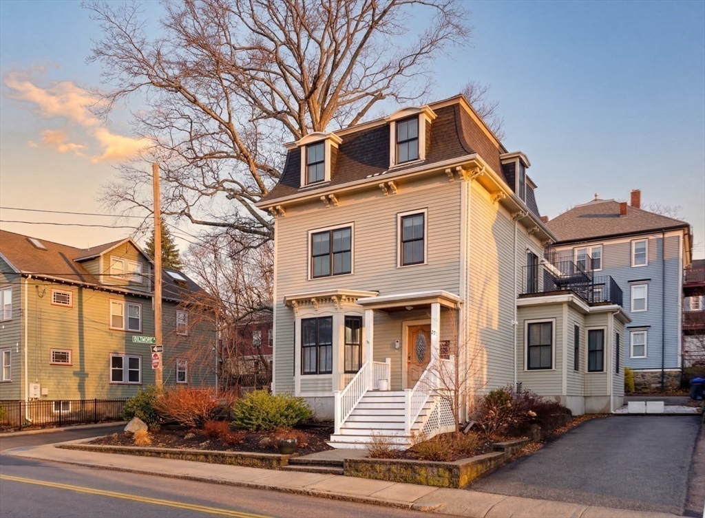 291 Lamartine Street, Unit 2 Boston, MA 02130 - Photo 1 of 18 a front view of a house with a yard