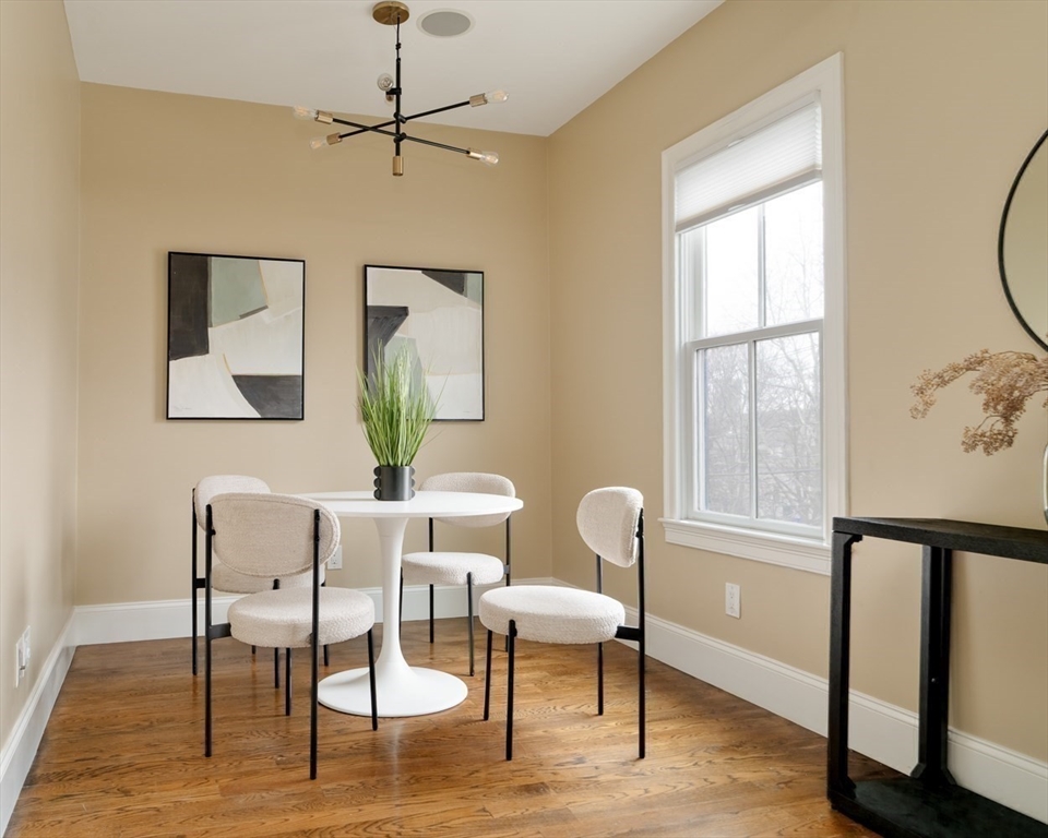 291 Lamartine Street, Unit 2 Boston, MA 02130 - Photo 5 of 18 a view of a livingroom with furniture window and wooden floor