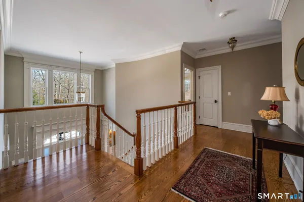 a view of entryway with wooden floor