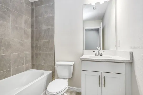 a sign on the side of the wall