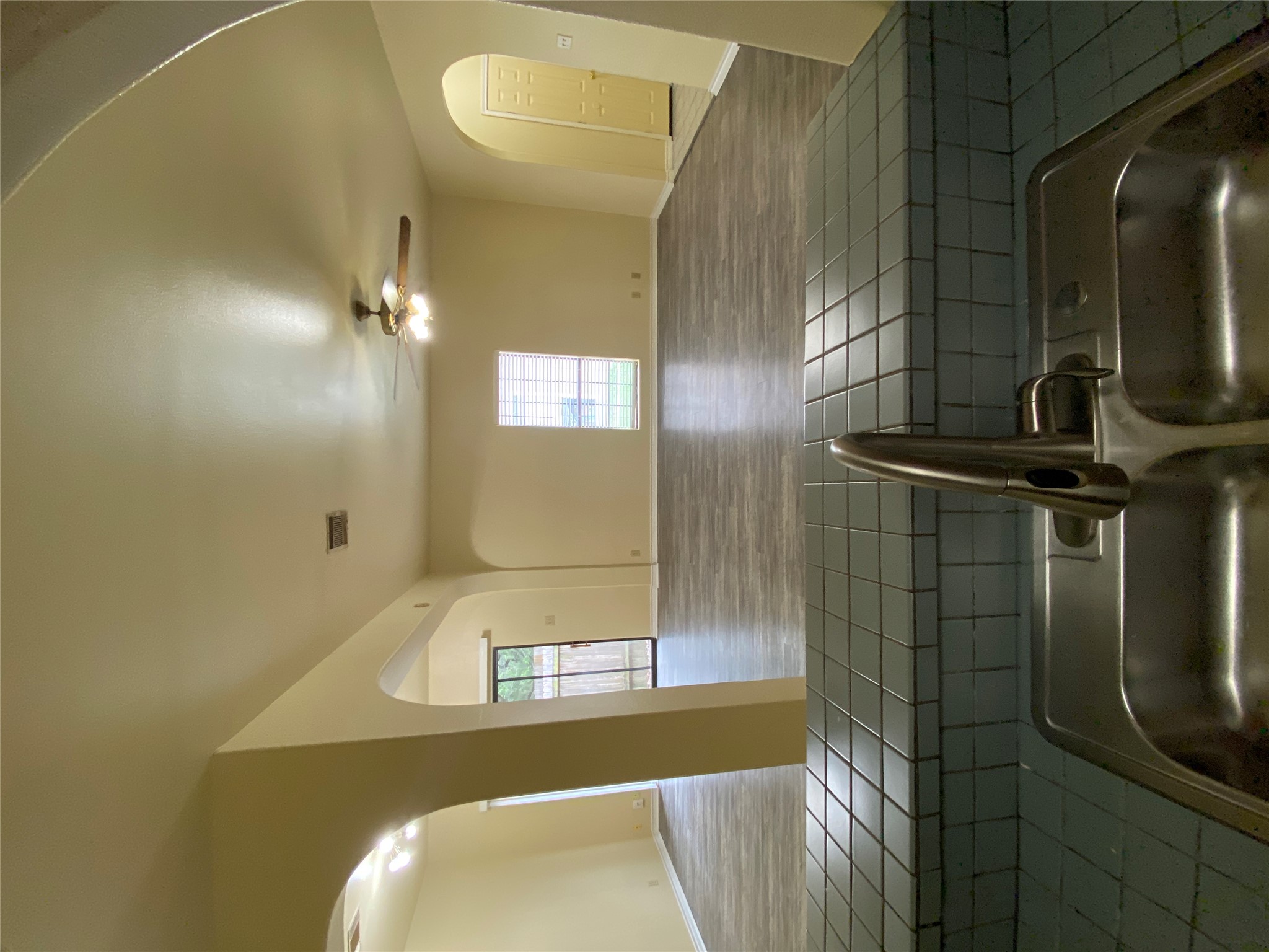 2605 Alcott Lane, Unit B Austin, TX 78748 - Photo 15 of 15 An open floorplan with durable flooring and arched doorways creates an inviting flow.