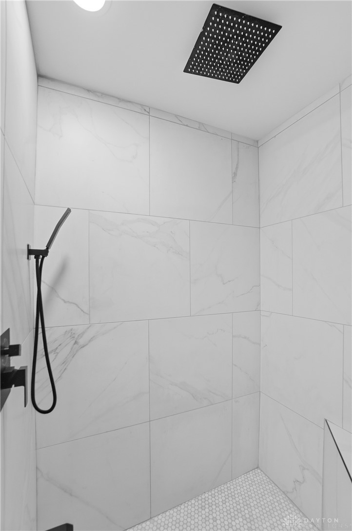 25 Englewood Road Springfield, OH 45504 - Photo 28 of 66 Spacious shower with Rain head shower plus a built in seat.