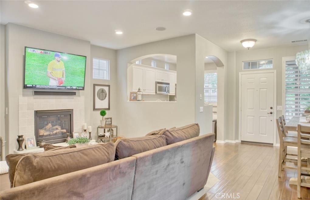 2 Evergreen Road Ladera Ranch, CA 92694 - Photo 3 of 21 a living room with furniture and a fireplace