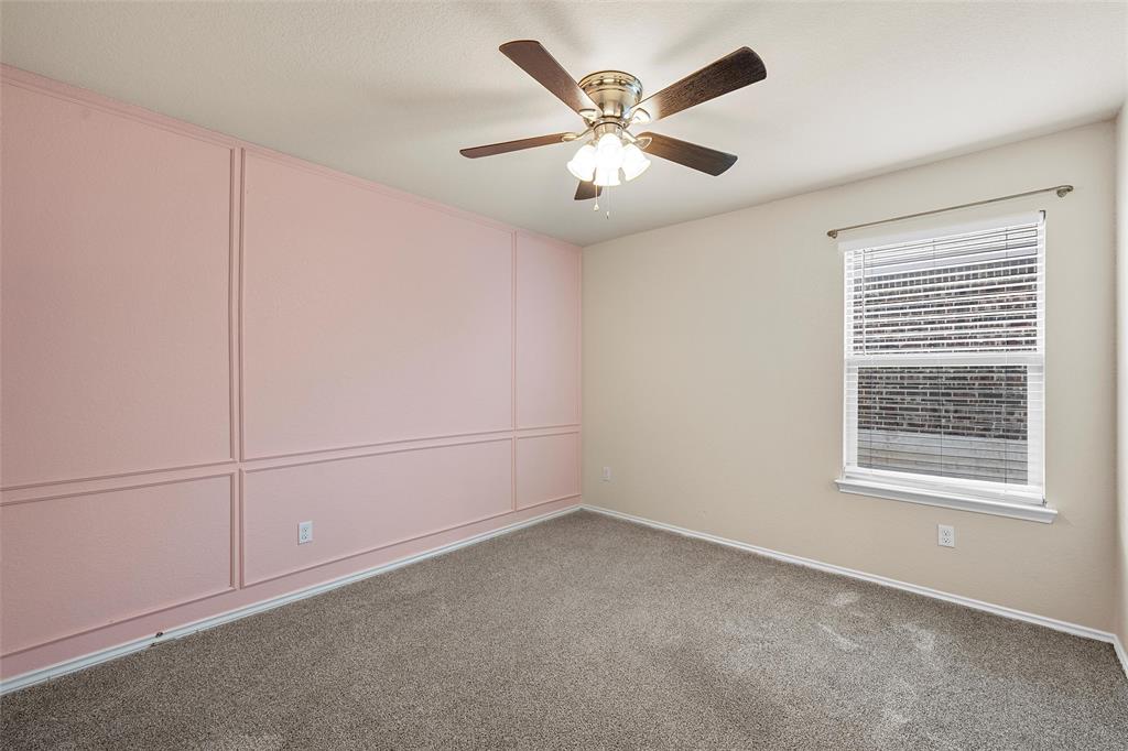 3217 Beutel Road Lorena, TX 76655 - Photo 26 of 40 Carpeted empty room with ceiling fan and baseboards