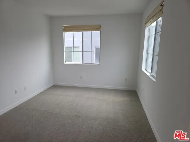 a bathroom with a bathtub and a toilet