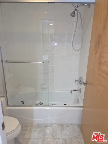 an empty room with a bathroom