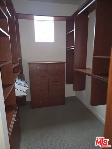 a bathroom with a double vanity sink and a bathtub