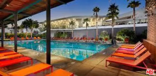 a view of a swimming pool from a terrace
