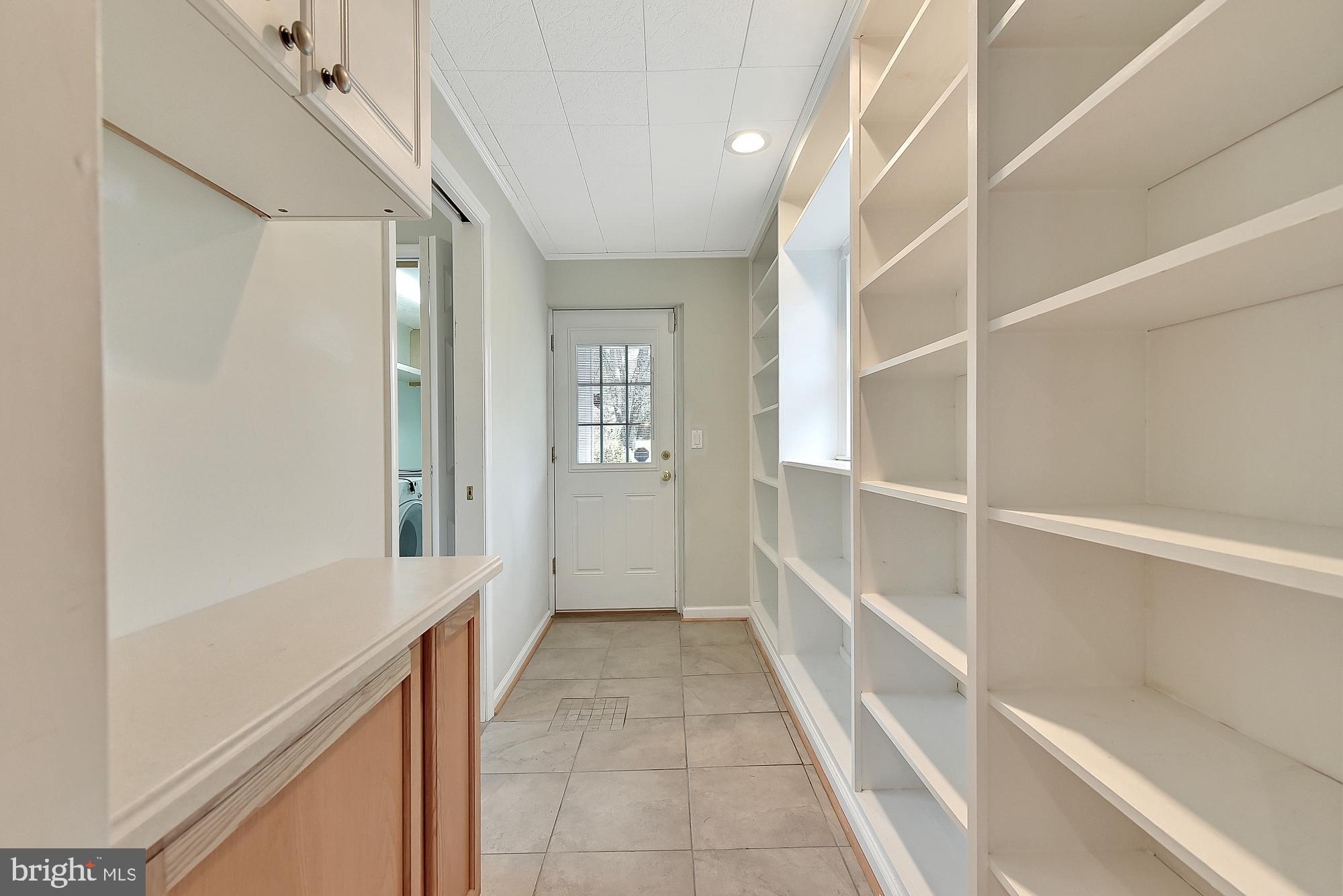 15811 Hughes Road Poolesville, MD 20837 - Photo 22 of 49 Plenty of more pantry space in rear foyer