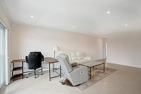 a work room with furniture and a chair