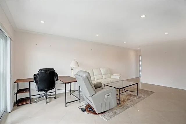 a work room with furniture and a chair