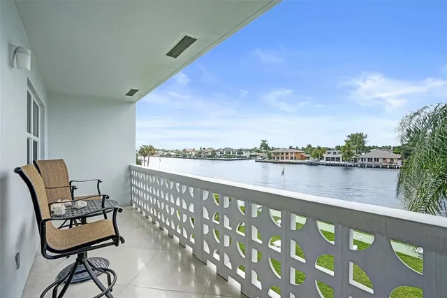 a view of a lake with a big yard