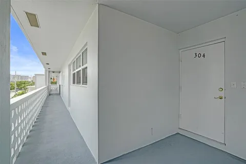 a view of a swimming pool and a yard