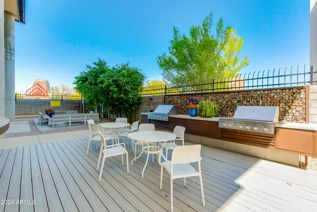 a view of a chairs and table on the wooden floor